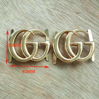 пряжки GG